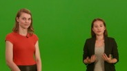 Presenters in front of the green screen